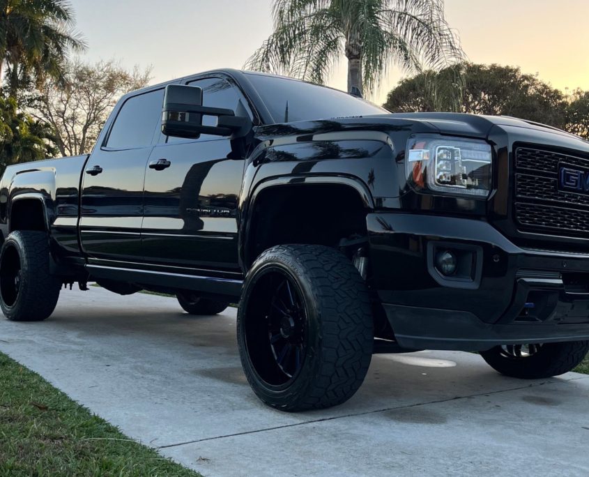 Black GMC Truck Black GMC truck with a deep, mirror-like shine after professional detailing in Palm Beach County.