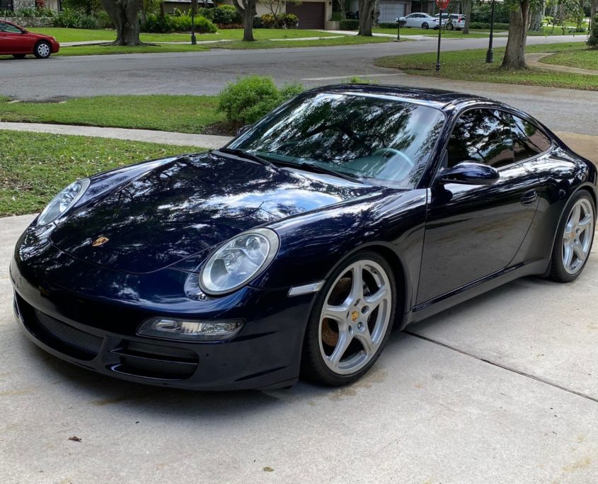 Dark Blue Porsche Dark blue Porsche with a deep, glossy finish after professional detailing in Palm Beach County.