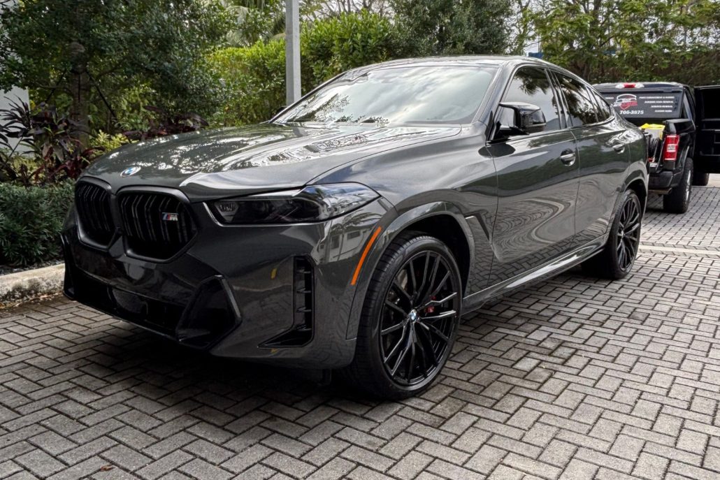 Gray BMW Gray BMW with a sleek, reflective finish after professional detailing in Palm Beach County.