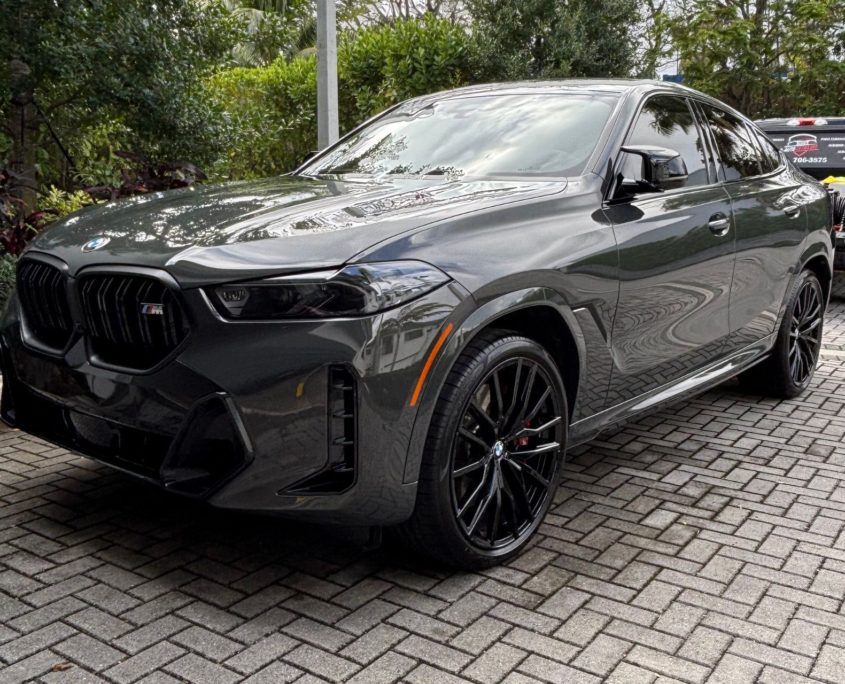 Gray BMW Gray BMW with a sleek, reflective finish after professional detailing in Palm Beach County.