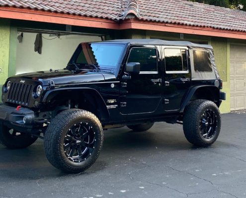 Jeep Wrangler Jeep Wrangler with a clean, glossy exterior after professional detailing in Palm Beach County.