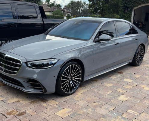 Gray Mercedes Gray Mercedes sedan with a polished exterior after professional detailing in Palm Beach County.