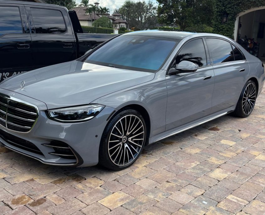 Gray Mercedes Gray Mercedes sedan with a polished exterior after professional detailing in Palm Beach County.