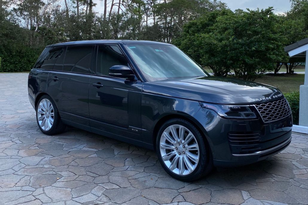 Black Range Rover Black Range Rover with a deep, mirror-like shine after professional detailing in Palm Beach County.