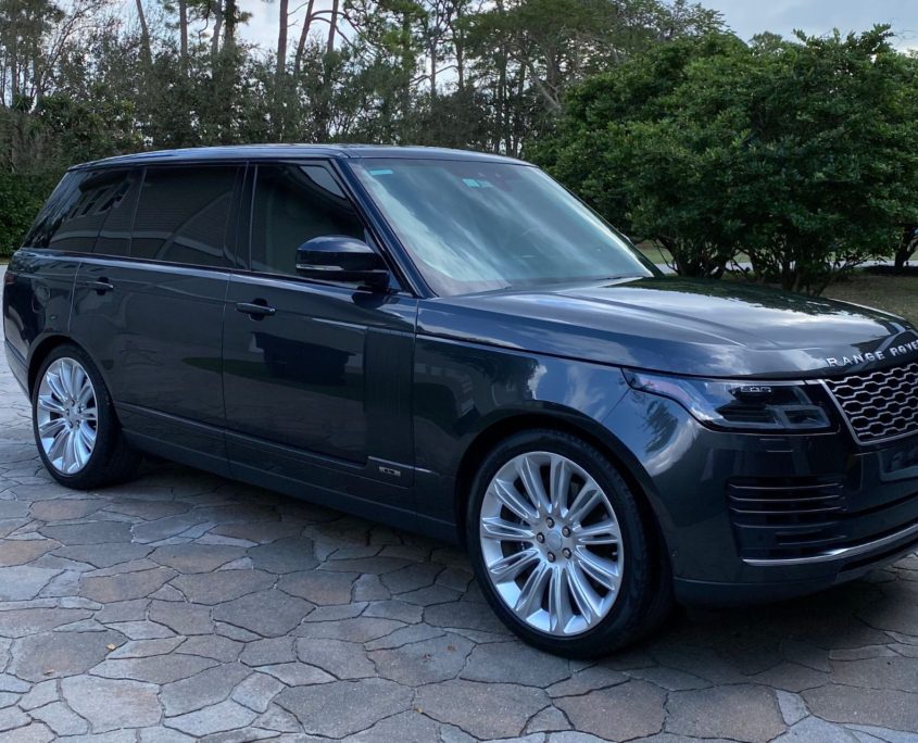 Black Range Rover Black Range Rover with a deep, mirror-like shine after professional detailing in Palm Beach County.