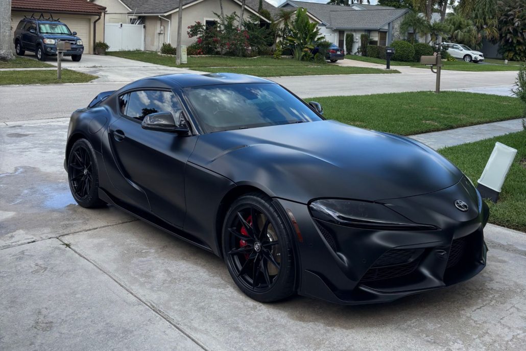 Black Toyota Supra Black Toyota Supra with a deep matte finish after professional detailing in Palm Beach County.