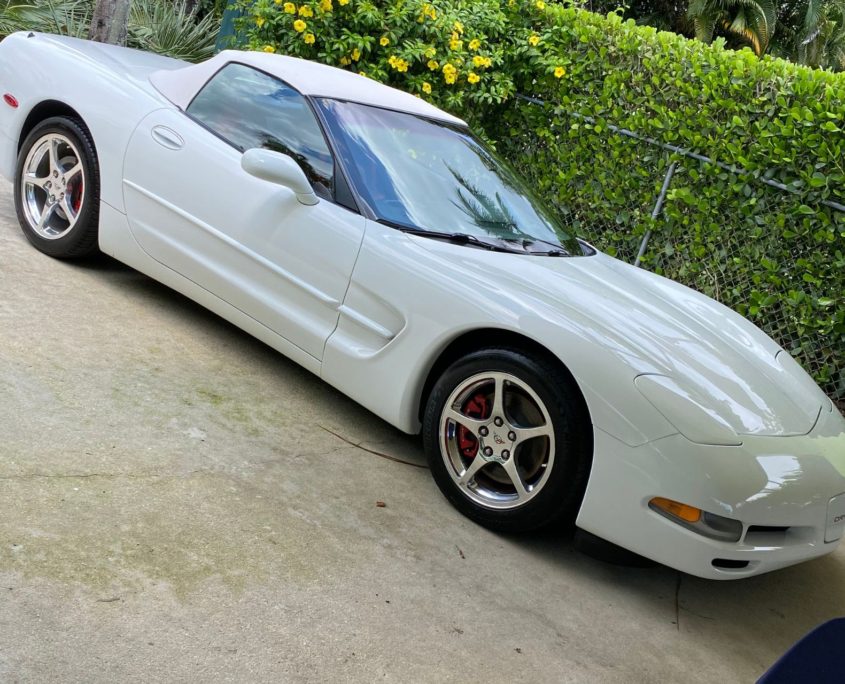 White Corvette White Corvette with a high-gloss reflective finish after professional detailing in Palm Beach County.